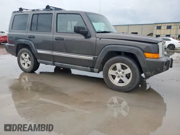 2006 Jeep Commander with VIN 1J8HH48NX6C106832, listed as a Copart auction lot 60544515 with 170,404 mi miles and Clean title. Bid and sale history available at DreamBid. Image 4.