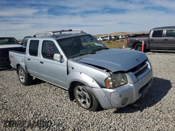2001 Nissan Frontier SC SuperCharger with VIN 1N6MD27Y11C370609, listed as a Copart auction lot 77222194 with Not provided miles and Clean title. Bid and sale history available at DreamBid. Image 4.