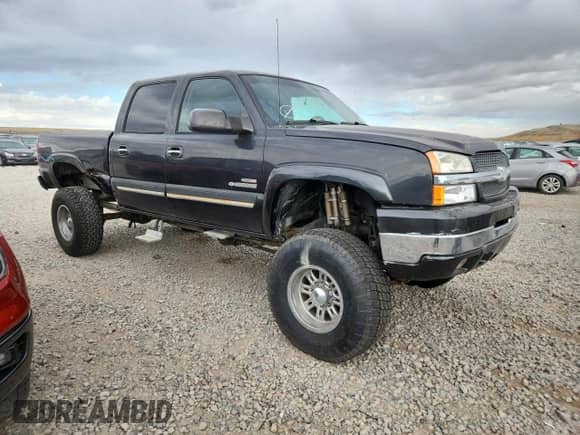 2003 Chevrolet Silverado 2500HD LS с VIN 1GCHK23153F256455, выставлен на аукционе Copart как лот 84300255 с пробегом 192 616 миль миль и Списание • Salvage title. История ставок и продаж доступна на DreamBid. Изображение 4.