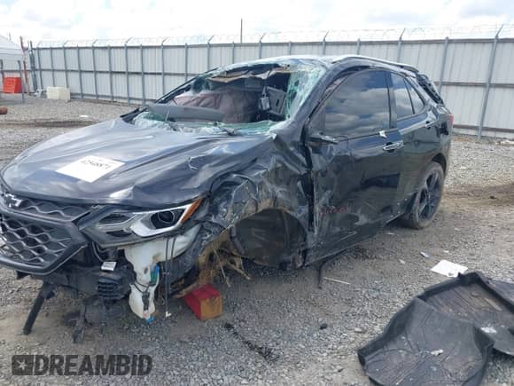 2020 Chevrolet Equinox Premier with VIN 2GNAXPEX9L6153106, listed as a IAAI auction lot 42548871 with 105,519 mi miles and . Bid and sale history available at DreamBid. Image 6.