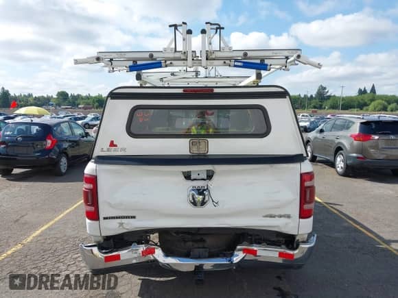 2020 Ram 1500 Big Horn with VIN 1C6RRFFG7LN263363, listed as a IAAI auction lot 42348930 with 34,161 mi miles and . Bid and sale history available at DreamBid. Image 6.