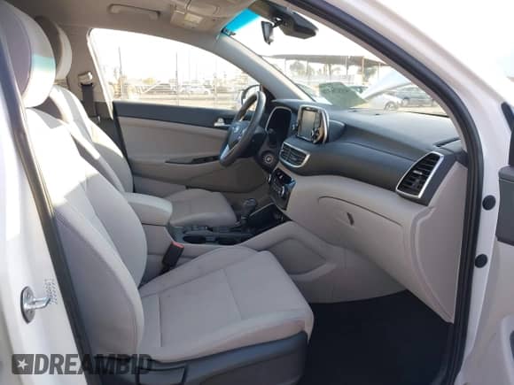 2019 Hyundai Tucson SE z VIN KM8J23A49KU859337, wystawiony jako IAAI lot #43526370 z przebiegiem 54 968 mil mil oraz . Historia ofert i sprzedaży dostępna na DreamBid. Obrazek 5.