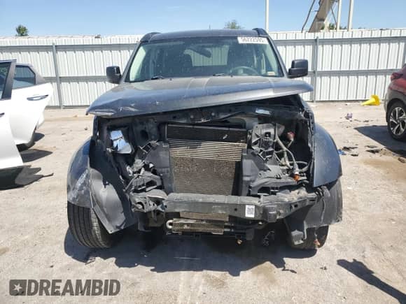 2011 Dodge Nitro Heat with VIN 1D4PU4GK3BW580980, listed as a Copart auction lot 56222595 with 231,178 mi miles and Salvage title. Bid and sale history available at DreamBid. Image 5.