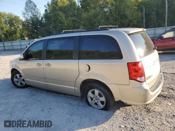 2013 Dodge Grand Caravan SXT with VIN 2C4RDGCG1DR575507, listed as a Copart auction lot 80065985 with 185,478 mi miles and Salvage title. Bid and sale history available at DreamBid. Image 2.