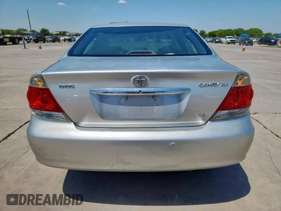 2006 Toyota Camry XLE с VIN 4T1BF32KX6U117976, выставлен на аукционе Copart как лот 67221655 с пробегом 152 103 миль миль и Списание • Salvage title. История ставок и продаж доступна на DreamBid. Изображение 6.