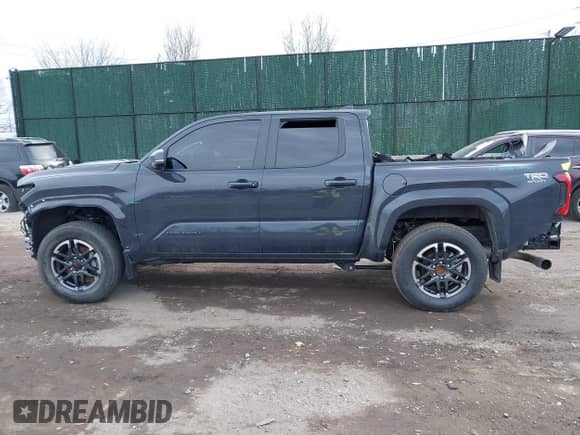 2024 Toyota Tacoma SR5 with VIN 3TYLB5JN1RT039046, listed as a IAAI auction lot 41610499 with 6,455 mi miles and . Bid and sale history available at DreamBid. Image 15.