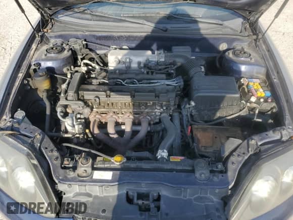 2003 Hyundai Tiburon с VIN KMHHM65D03U095741, выставлен на аукционе Copart как лот 55147305 с пробегом 170 946 миль миль и Списание • Salvage title. История ставок и продаж доступна на DreamBid. Изображение 12.