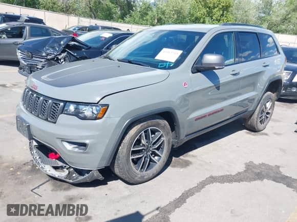 2020 Jeep Grand Cherokee Trailhawk with VIN 1C4RJFLG7LC384524, listed as a IAAI auction lot 42312713 with 50,221 mi miles and . Bid and sale history available at DreamBid. Image 2.