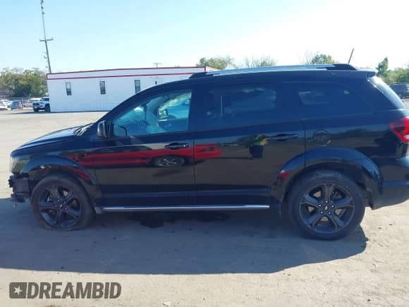 2019 Dodge Journey Crossroad with VIN 3C4PDCGG7KT815518, listed as a IAAI auction lot 43224536 with 97,784 mi miles and . Bid and sale history available at DreamBid. Image 14.
