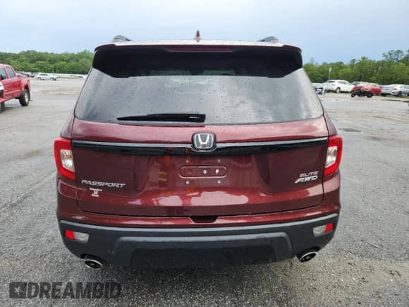 2021 Honda Passport Elite с VIN 5FNYF8H07MB002713, выставлен на аукционе Copart как лот 64270625 с пробегом 36 744 миль миль и Списание • Salvage title. История ставок и продаж доступна на DreamBid. Изображение 6.