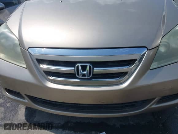 2005 Honda Odyssey EX z VIN 5FNRL38465B409863, wystawiony jako IAAI lot #43009481 z przebiegiem 255 902 mil mil oraz . Historia ofert i sprzedaży dostępna na DreamBid. Obrazek 6.