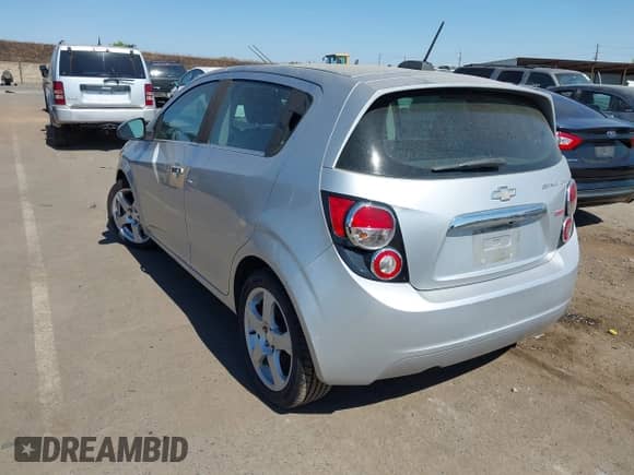 2015 Chevrolet Sonic LTZ with VIN 1G1JE6SB3F4169141, listed as a IAAI auction lot 42780451 with 145,950 mi miles and . Bid and sale history available at DreamBid. Image 3.