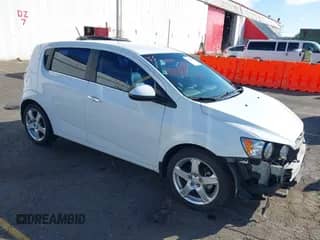 2014 Chevrolet Sonic LTZ with VIN 1G1JE6SB8E4227548, listed as a IAAI auction lot 43316295 with 59,646 mi miles and . Bid and sale history available at DreamBid. Image 1.