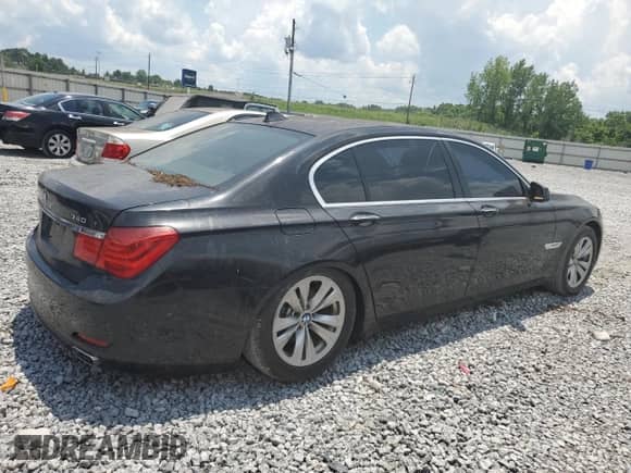2012 BMW 7 Series 740Li with VIN WBAKB4C55CC577012, listed as a Copart auction lot 62151725 with 111,320 mi miles and Salvage title. Bid and sale history available at DreamBid. Image 3.