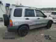2002 Chevrolet Tracker with VIN 2CNBE13C926934704, listed as a Copart auction lot 70717194 with 189,076 mi miles and Salvage title. Bid and sale history available at DreamBid. Image 3.