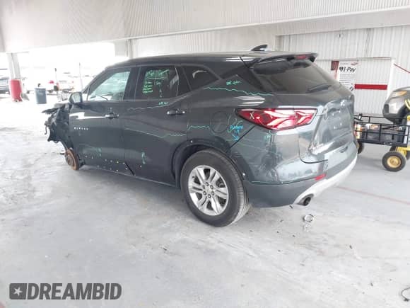 2019 Chevrolet Blazer with VIN 3GNKBBRAXKS596263, listed as a IAAI auction lot 42903143 with 127,850 mi miles and . Bid and sale history available at DreamBid. Image 3.