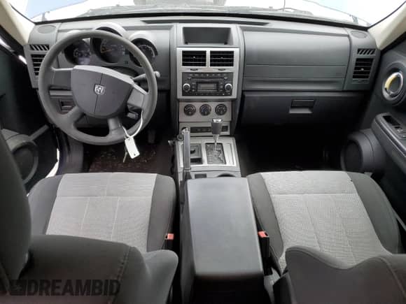 2009 Dodge Nitro SE with VIN 1D8GU28K19W512589, listed as a Copart auction lot 51421254 with 219,813 mi miles and Salvage title. Bid and sale history available at DreamBid. Image 8.