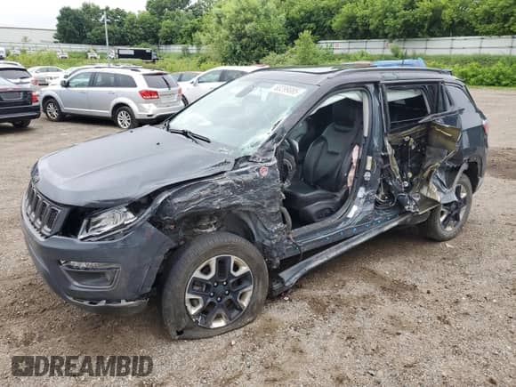 2017 Jeep Compass Trailhawk with VIN 3C4NJDDBXHT688190, listed as a Copart auction lot 63299085 with 104,758 mi miles and Clean title. Bid and sale history available at DreamBid. Image 1.