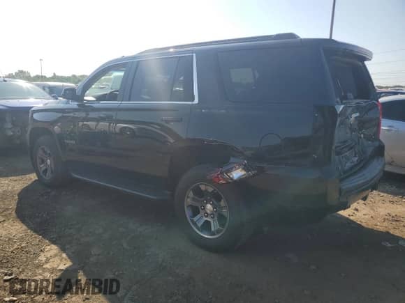 2018 Chevrolet Tahoe LS with VIN 1GNSKAKC6JR349376, listed as a Copart auction lot 63391835 with 88,574 mi miles and Salvage title. Bid and sale history available at DreamBid. Image 2.
