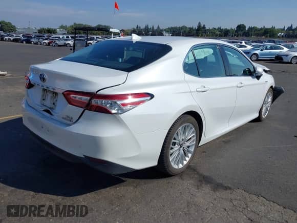 2020 Toyota Camry Hybrid XLE z VIN 4T1F31AK1LU541672, wystawiony jako IAAI lot #43125531 z przebiegiem 207 911 mil mil oraz . Historia ofert i sprzedaży dostępna na DreamBid. Obrazek 4.