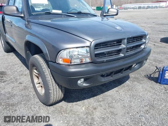 2003 Dodge Dakota Sport with VIN 1D7HG38N73S168586, listed as a IAAI auction lot 41865351 with 149,314 mi miles and . Bid and sale history available at DreamBid. Image 6.