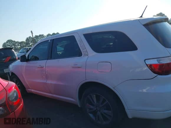 2013 Dodge Durango R/T with VIN 1C4SDHCT8DC648644, listed as a IAAI auction lot 42670866 with 196,815 mi miles and . Bid and sale history available at DreamBid. Image 14.