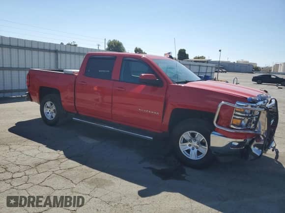 2015 Chevrolet Silverado 1500 LT with VIN 3GCPCREC9FG136726, listed as a Copart auction lot 71115305 with 37,077 mi miles and Salvage title. Bid and sale history available at DreamBid. Image 4.