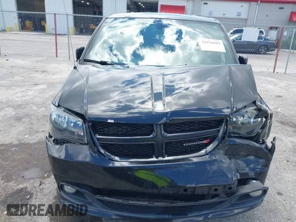 2019 Dodge Grand Caravan GT with VIN 2C4RDGEG2KR675982, listed as a IAAI auction lot 42970109 with 104,372 mi miles and . Bid and sale history available at DreamBid. Image 6.