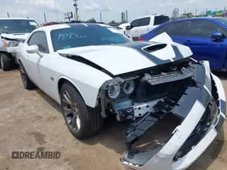 2015 Dodge Challenger SRT 392 with VIN 2C3CDZDJ1FH767602, listed as a IAAI auction lot 42468083 with 104,525 mi miles and . Bid and sale history available at DreamBid. Image 1.
