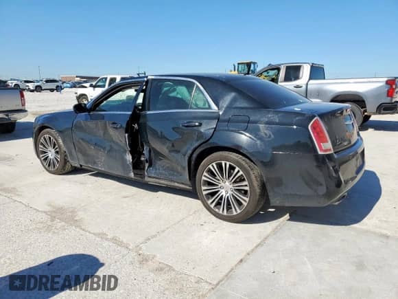 2014 Chrysler 300 S with VIN 2C3CCABT7EH119561, listed as a Copart auction lot 53995655 with 131,077 mi miles and Salvage title. Bid and sale history available at DreamBid. Image 2.