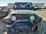 1997 Jeep Wrangler Sport with VIN 1J4FY19S0VP430844, listed as a Copart auction lot 65827275 with 91,868 mi miles and Salvage title. Bid and sale history available at DreamBid. Image 5.