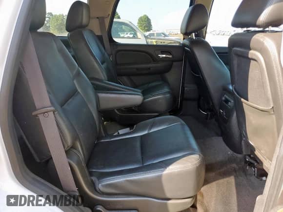 2012 Chevrolet Tahoe LTZ z VIN 1GNSCCE0XCR217010, wystawiony jako Copart lot #80916105 z przebiegiem 261 878 mil mil oraz Szkoda całkowita • Salvage title. Historia ofert i sprzedaży dostępna na DreamBid. Obrazek 11.