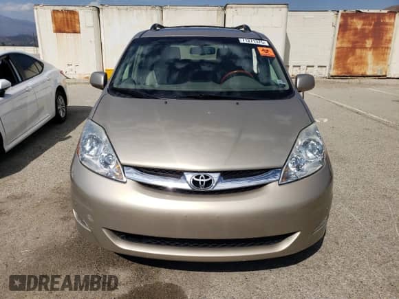 2010 Toyota Sienna XLE с VIN 5TDYK4CC9AS290084, выставлен на аукционе Copart как лот 71271375 с пробегом 95 684 миль миль и Списание • Salvage title. История ставок и продаж доступна на DreamBid. Изображение 5.