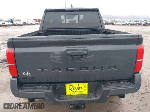 2024 Toyota Tacoma SR5 with VIN 3TMLB5JNXRM055645, listed as a IAAI auction lot 41208771 with 984 mi miles and . Bid and sale history available at DreamBid. Image 17.