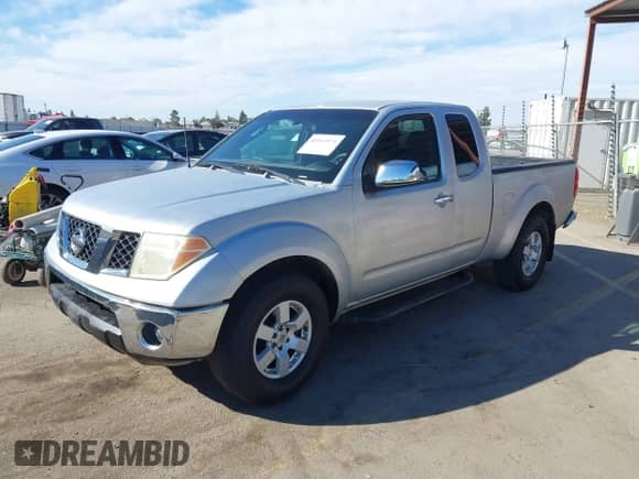 2005 Nissan Frontier SE with VIN 1N6AD06W75C445178, listed as a IAAI auction lot 40915971 with 163,801 mi miles and . Bid and sale history available at DreamBid. Image 2.