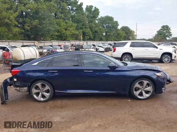 2018 Honda Accord Touring with VIN 1HGCV2F93JA046886, listed as a IAAI auction lot 43341908 with 80,507 mi miles and . Bid and sale history available at DreamBid. Image 14.
