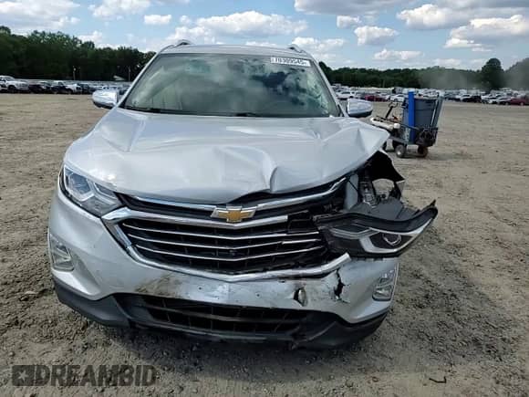 2020 Chevrolet Equinox Premier z VIN 2GNAXXEV2L6247231, wystawiony jako Copart lot #70309545 z przebiegiem 86 837 mil mil oraz Szkoda całkowita • Salvage title. Historia ofert i sprzedaży dostępna na DreamBid. Obrazek 14.