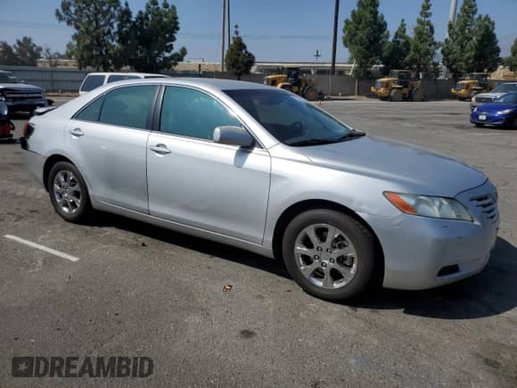 2007 Toyota Camry LE с VIN 4T1BE46K47U507329, выставлен на аукционе Copart как лот 82326205 с пробегом 213 541 миль миль и Списание • Salvage title. История ставок и продаж доступна на DreamBid. Изображение 4.