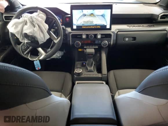 2024 Toyota Tacoma SR5 with VIN 3TMLB5JN6RM022769, listed as a Copart auction lot 85087965 with 17,767 mi miles and Salvage title. Bid and sale history available at DreamBid. Image 8.