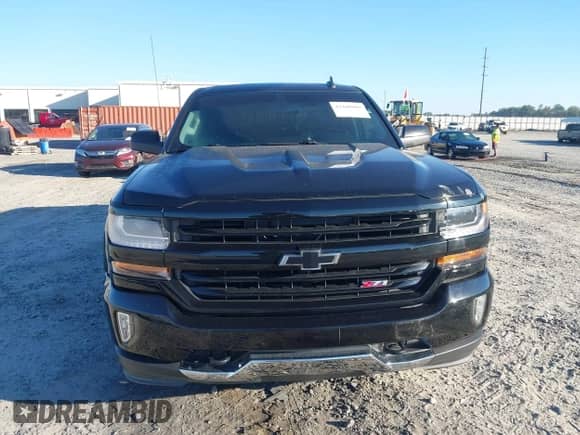 2018 Chevrolet Silverado 1500 LT z VIN 3GCUKRECXJG276511, wystawiony jako IAAI lot #43460009 z przebiegiem 151 453 mil mil oraz . Historia ofert i sprzedaży dostępna na DreamBid. Obrazek 12.