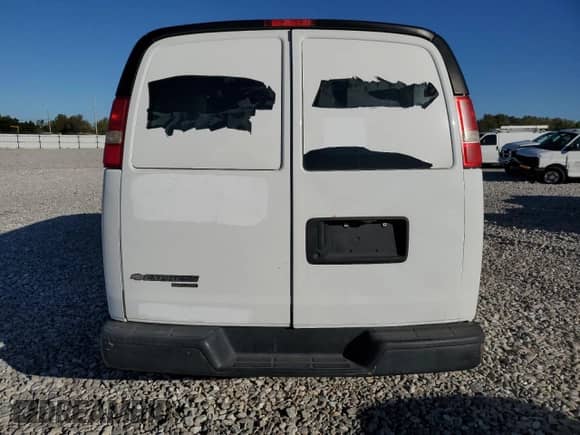 2013 Chevrolet Express Cargo with VIN 1GCWGFBA9D1180058, listed as a Copart auction lot 63494745 with 163,668 mi miles and Salvage title. Bid and sale history available at DreamBid. Image 6.