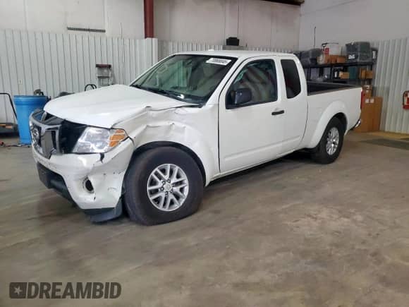 2017 Nissan Frontier SV with VIN 1N6BD0CTXHN737530, listed as a Copart auction lot 70869045 with 95,789 mi miles and Salvage title. Bid and sale history available at DreamBid. Image 1.