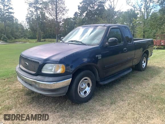 2002 Ford F-150 XL с VIN 1FTRX17W72NB36764, выставлен на аукционе Copart как лот 85647745 с пробегом Не указан миль и Списание • Salvage title. История ставок и продаж доступна на DreamBid. Изображение 2.