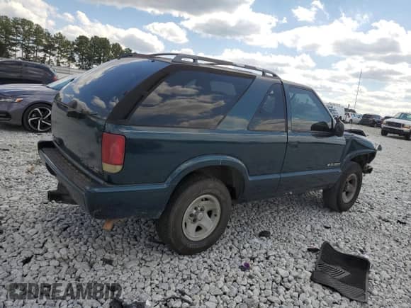 1996 Chevrolet Blazer LS с VIN 1GNCS18W2TK149760, выставлен на аукционе Copart как лот 70966534 с пробегом 306 307 миль миль и Списание • Salvage title. История ставок и продаж доступна на DreamBid. Изображение 3.