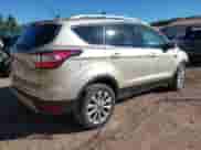 2017 Ford Escape Titanium with VIN 1FMCU9J95HUD42000, listed as a IAAI auction lot 43387558 with 122,185 mi miles and . Bid and sale history available at DreamBid. Image 4.