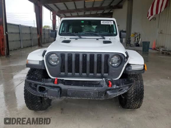 2022 Jeep Wrangler Unlimited Rubicon with VIN 1C4JJXFG4NW154732, listed as a Copart auction lot 45343675 with 18,702 mi miles and Salvage title. Bid and sale history available at DreamBid. Image 5.