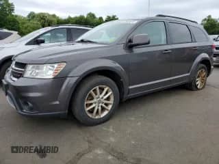 2015 Dodge Journey SXT with VIN 3C4PDCBG7FT669165, listed as a Copart auction lot 62682015 with 145,303 mi miles and Clean title. Bid and sale history available at DreamBid. Image 1.