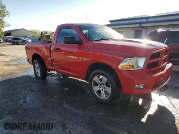 2012 Ram 1500 Express with VIN 3C6JD7AT0CG263039, listed as a Copart auction lot 84575185 with 202,886 mi miles and Salvage title. Bid and sale history available at DreamBid. Image 4.
