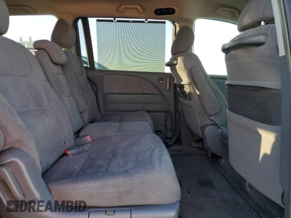 2005 Honda Odyssey EX с VIN 5FNRL38475B413498, выставлен на аукционе Copart как лот 86595645 с пробегом 63 930 миль миль и Списание • Salvage title. История ставок и продаж доступна на DreamBid. Изображение 11.