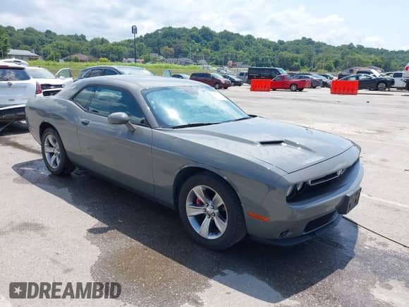 2017 Dodge Challenger SXT Plus with VIN 2C3CDZAG2HH568618, listed as a IAAI auction lot 42877253 with 107,306 mi miles and . Bid and sale history available at DreamBid. Image 1.
